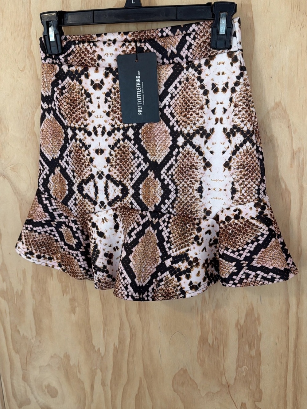 PrettyLittleThing Brown Snake-Print Flared Skirt
